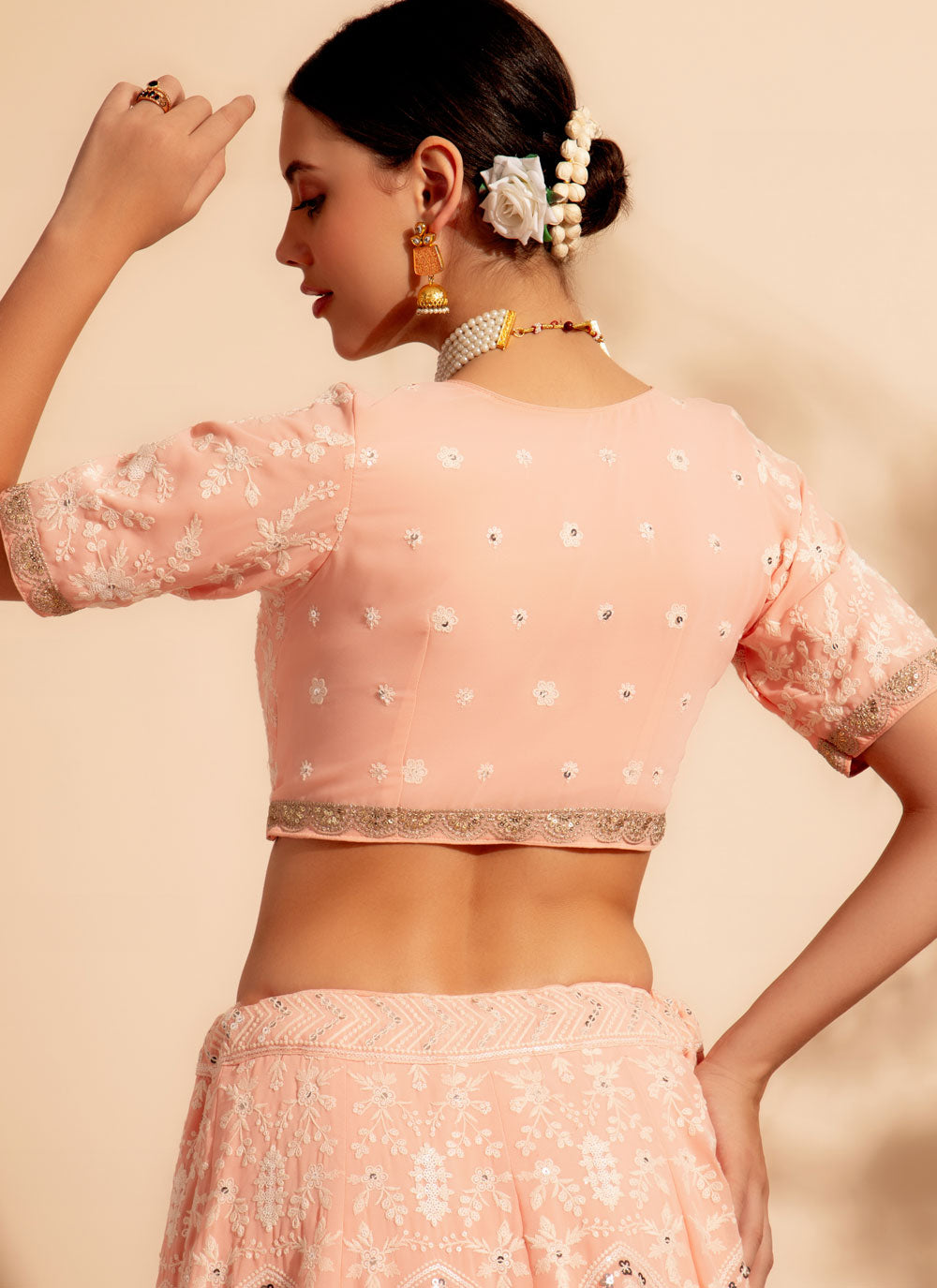 Embroidered And Sequins Work Georgette Lehenga Choli In Peach