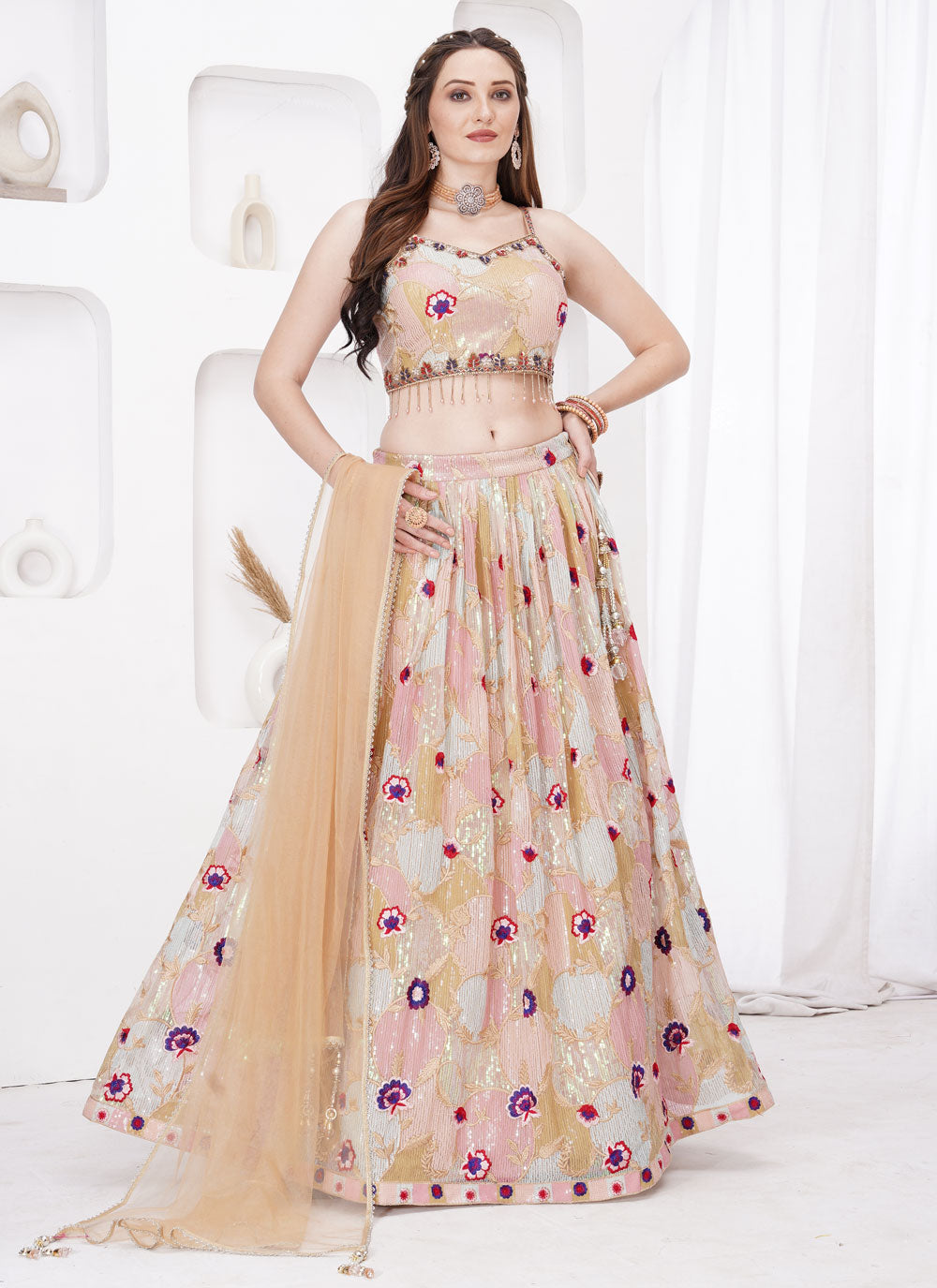 Embroidered And Sequins Work Net Readymade Lehenga Choli In Peach