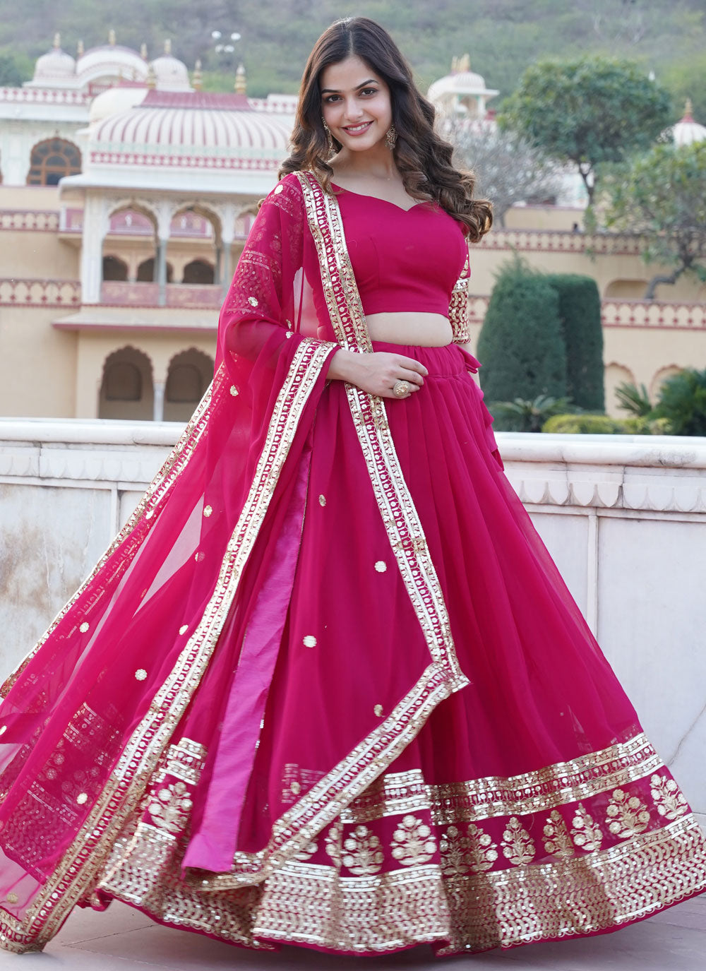 Pink Faux Georgette Lehenga Choli With Embroidered And Sequins Work