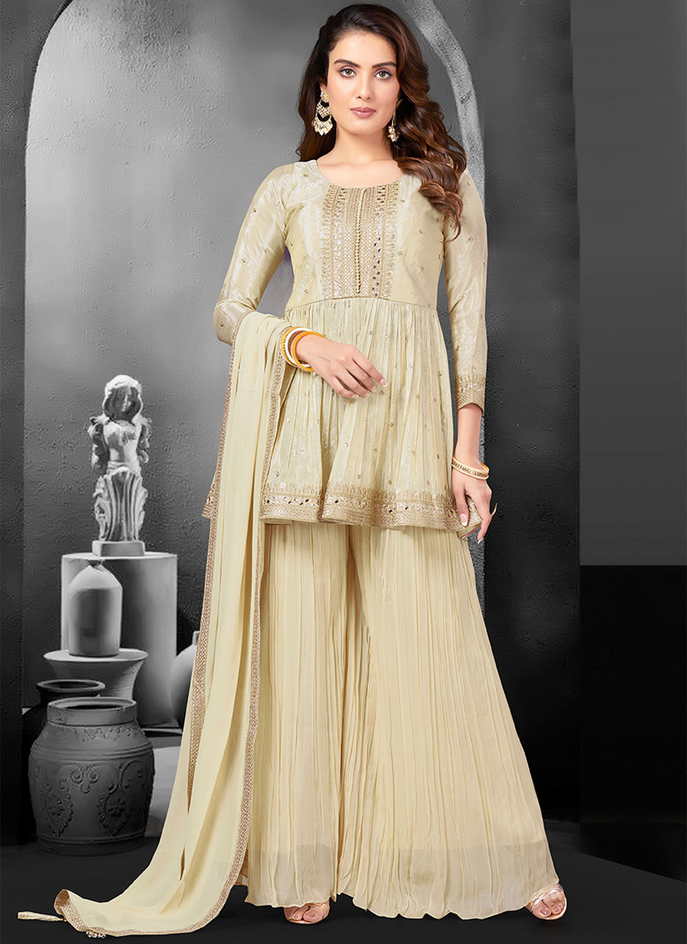 Embroidered And Mirror Work Silk Palazzo Salwar Suit In Cream