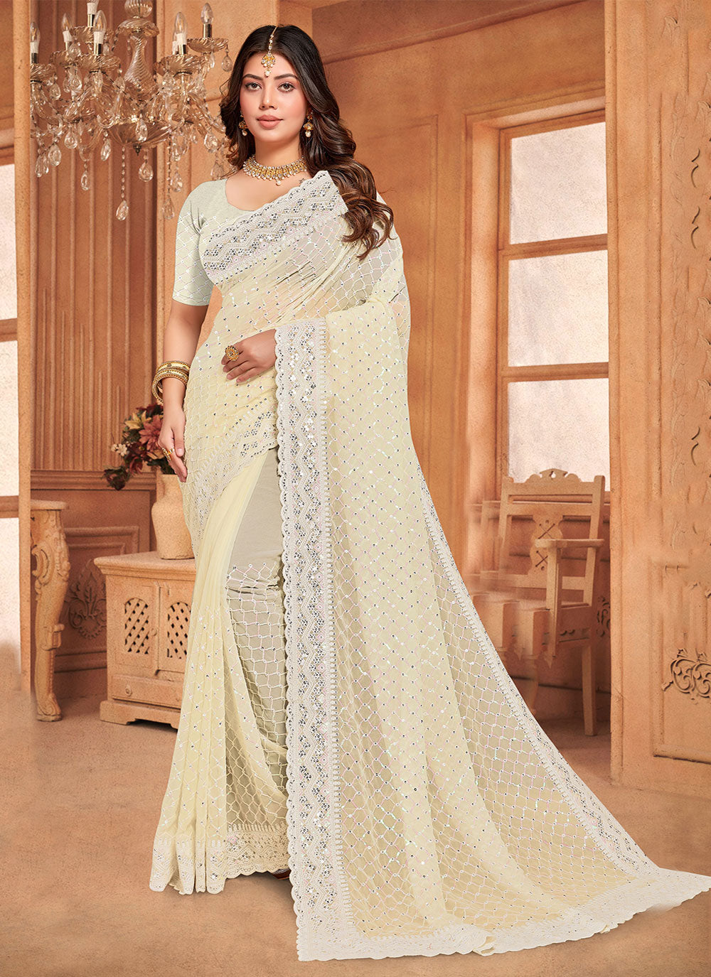 Embroidered And Sequins Work Georgette Trendy Saree In Cream