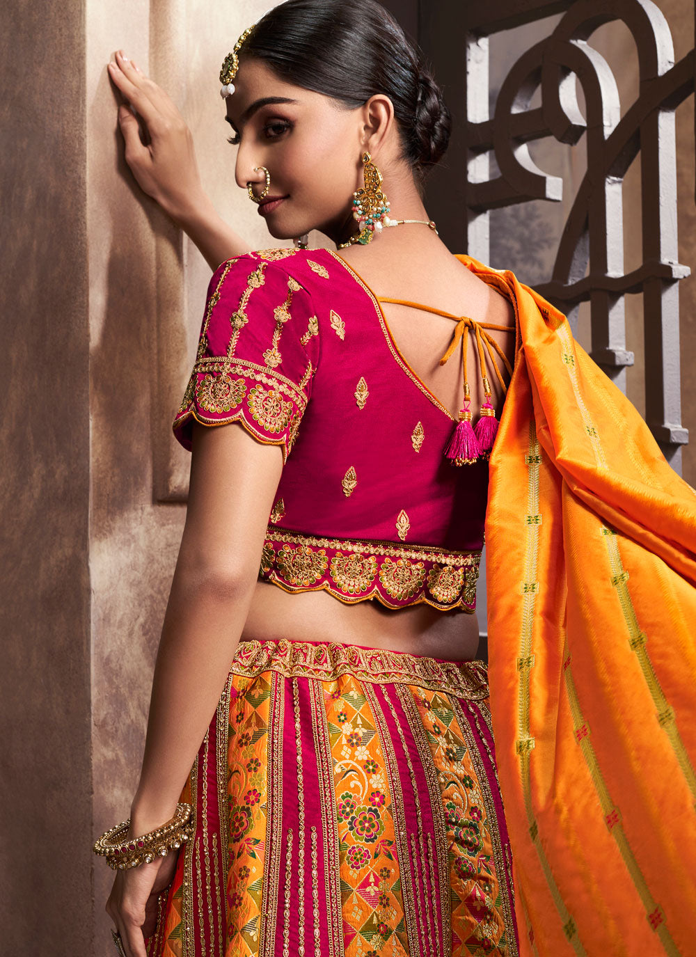 Cut, Embroidered And Patch Border Work Silk Lehenga Choli In Mustard And Pink