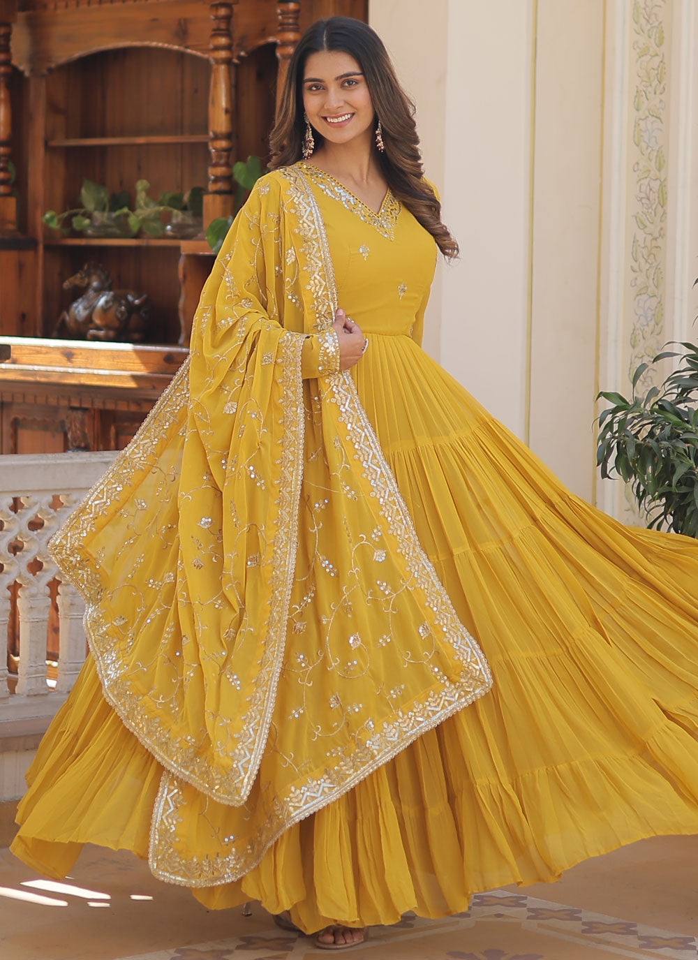 Yellow Faux Georgette Designer Gown With Embroidered And Sequins Work