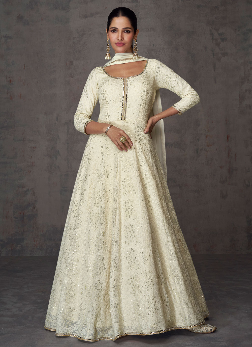 Exceeding Off White Designer Gown With Embroidered And Mirror Work