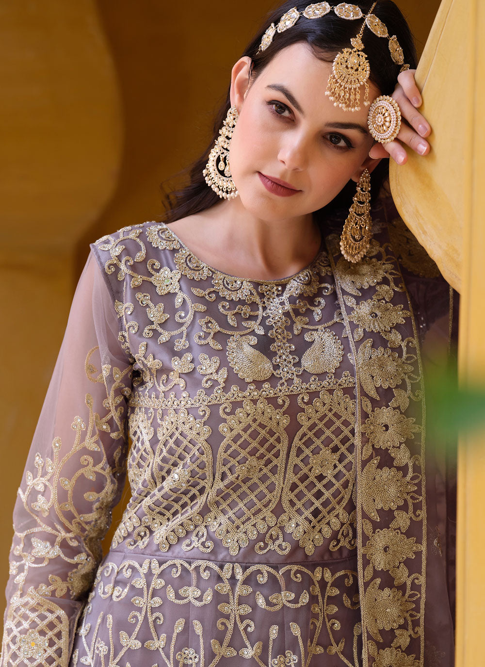 Purple Embroidered And Stone Work Net Trendy Suit