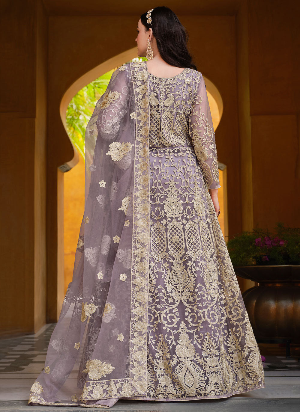 Purple Embroidered And Stone Work Net Trendy Suit