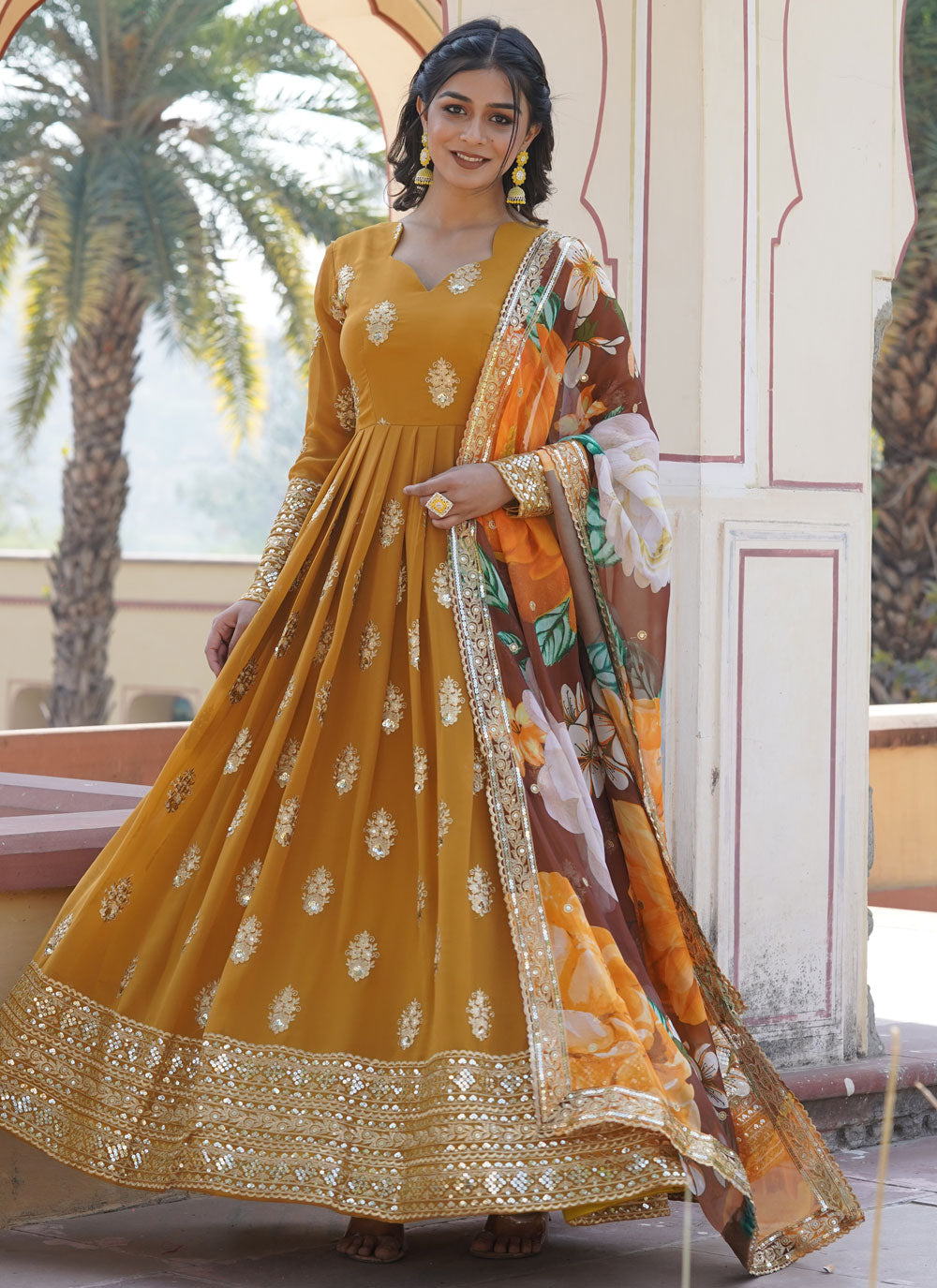 Yellow Faux Georgette Embroidered, Sequins And Zari Work Gown For Ceremonial