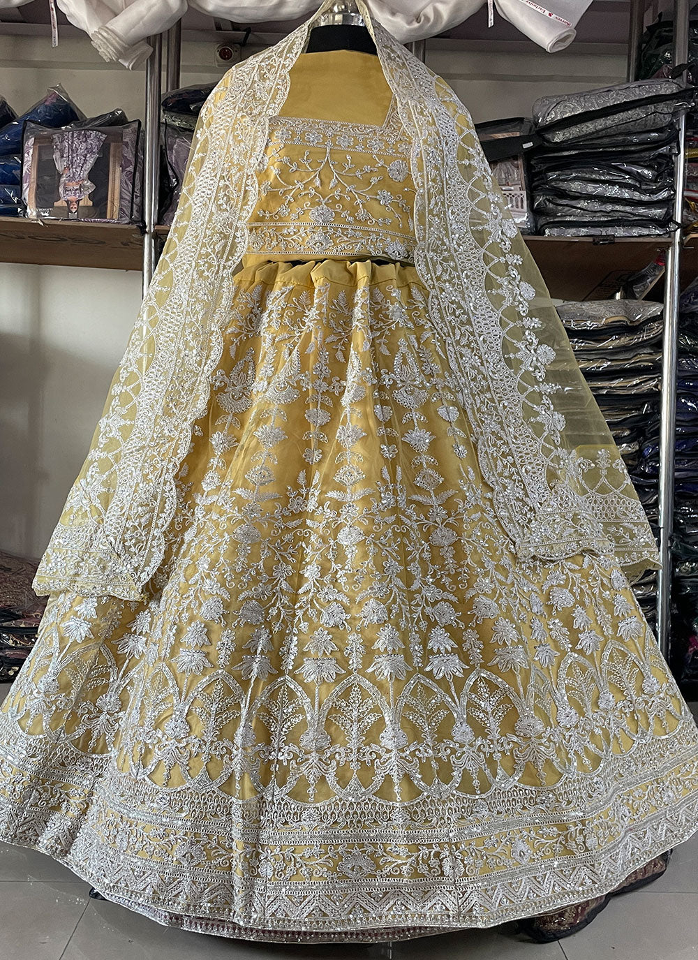 Embroidered And Sequins Work Net Lehenga Choli In Yellow