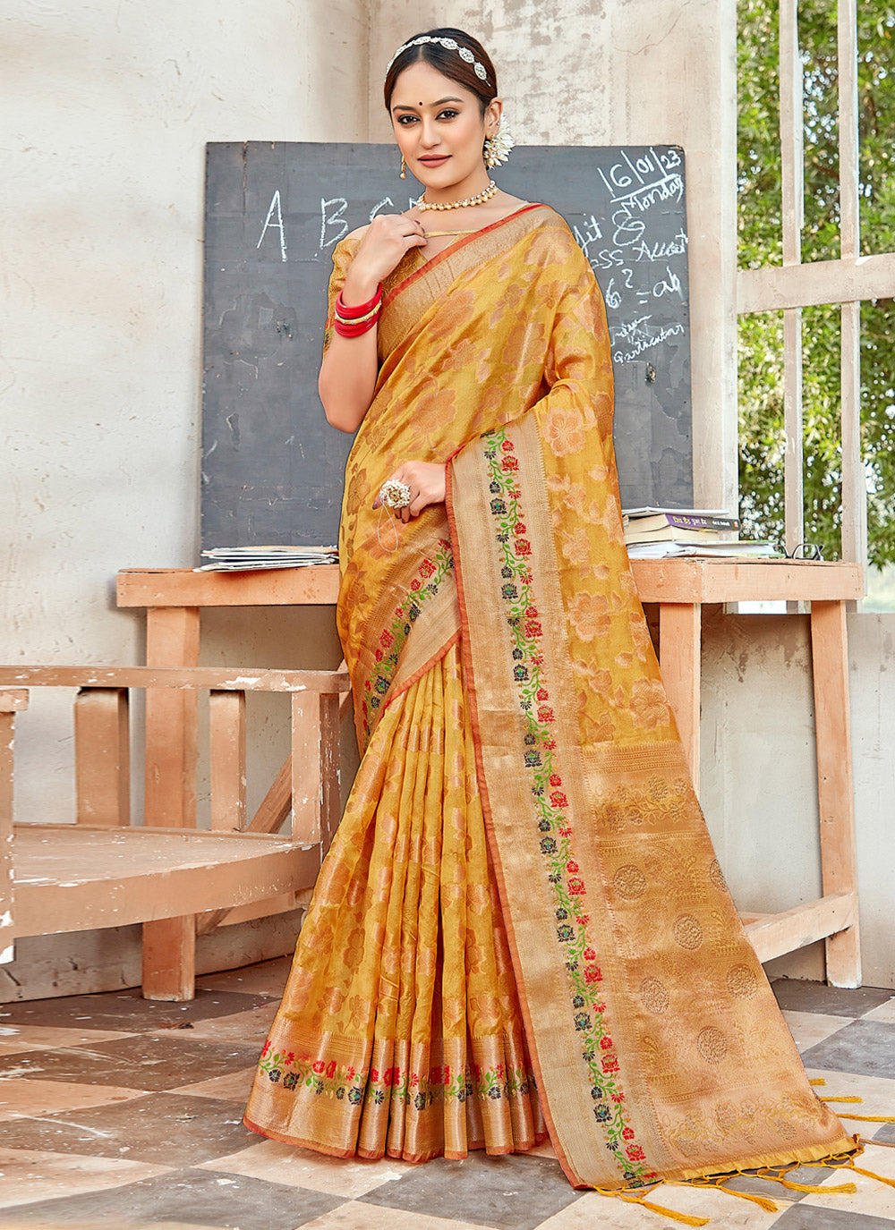Embroidered Organza Saree in Yellow